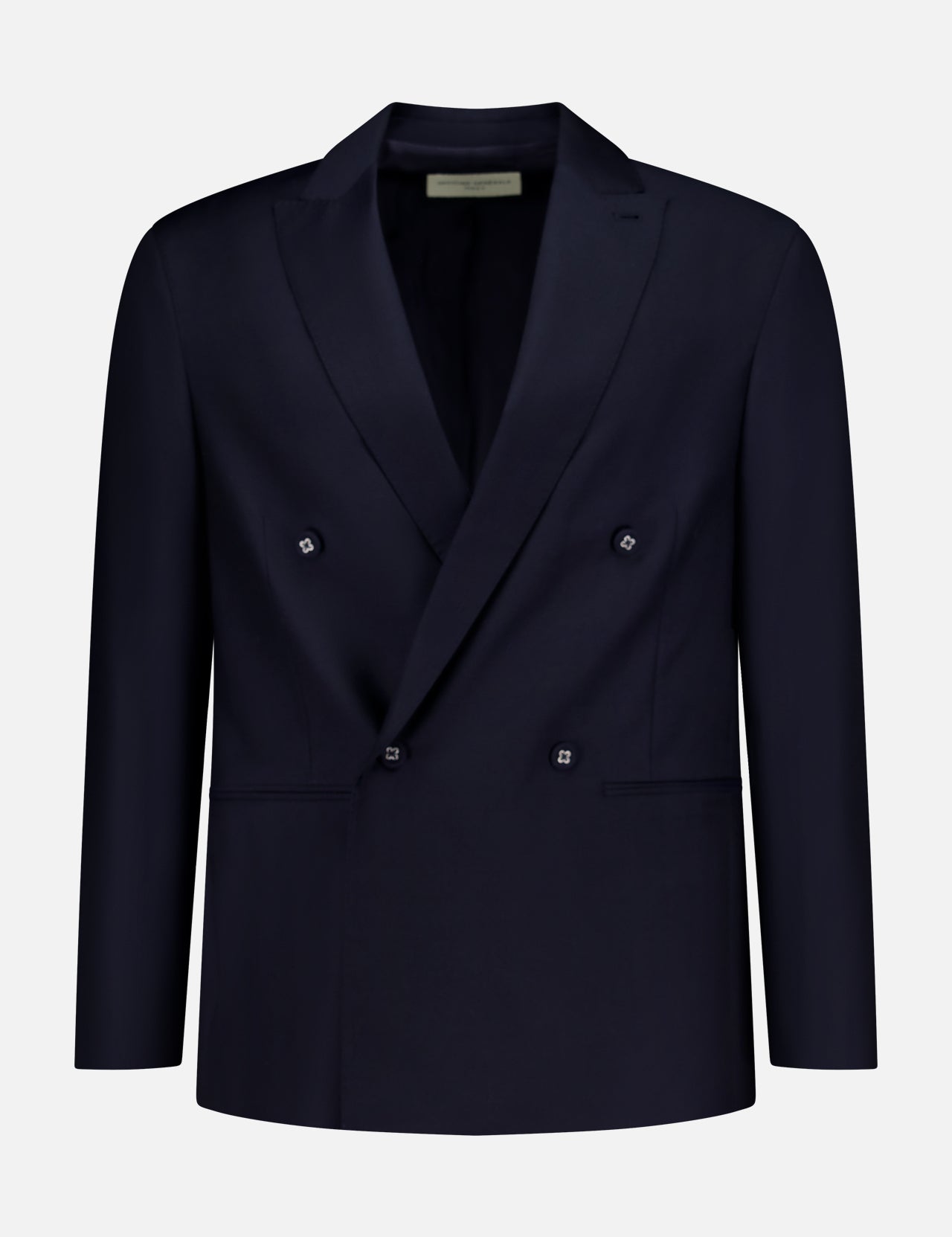 The OFFICINE GÉNÉRALE Merrick Twill Double Breasted Jacket is expertly tailored from virgin wool in a dark navy hue, featuring peak lapels, four front buttons, and two front pockets. It is showcased against a plain white background.