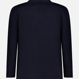 The OFFICINE GÉNÉRALE Merrick Twill Double Breasted Jacket is shown from the back in a plain, dark navy color, featuring long sleeves and a central seam with no visible buttons or other details.