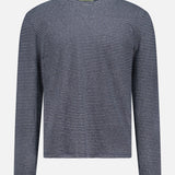The OFFICINE GÉNÉRALE Multico Long Sleeve Stripe T-shirt, featuring thin horizontal black and white stripes, a crew neckline, and a straight hem, is displayed on a plain white background.