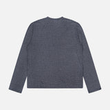 The OFFICINE GÉNÉRALE Multico Long Sleeve Stripe T-shirt, displayed from the back against a plain white background, features thin black and white horizontal stripes and offers a Parisian-inspired fit for effortless style.