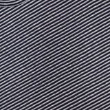 Close-up of the OFFICINE GÉNÉRALE Multico Long Sleeve Stripe T-shirt in navy and white, featuring a striped cotton-linen fabric with thin, evenly spaced lines and a visible brand label at the collar. This t-shirt offers a Parisian-inspired fit for an effortlessly stylish look.