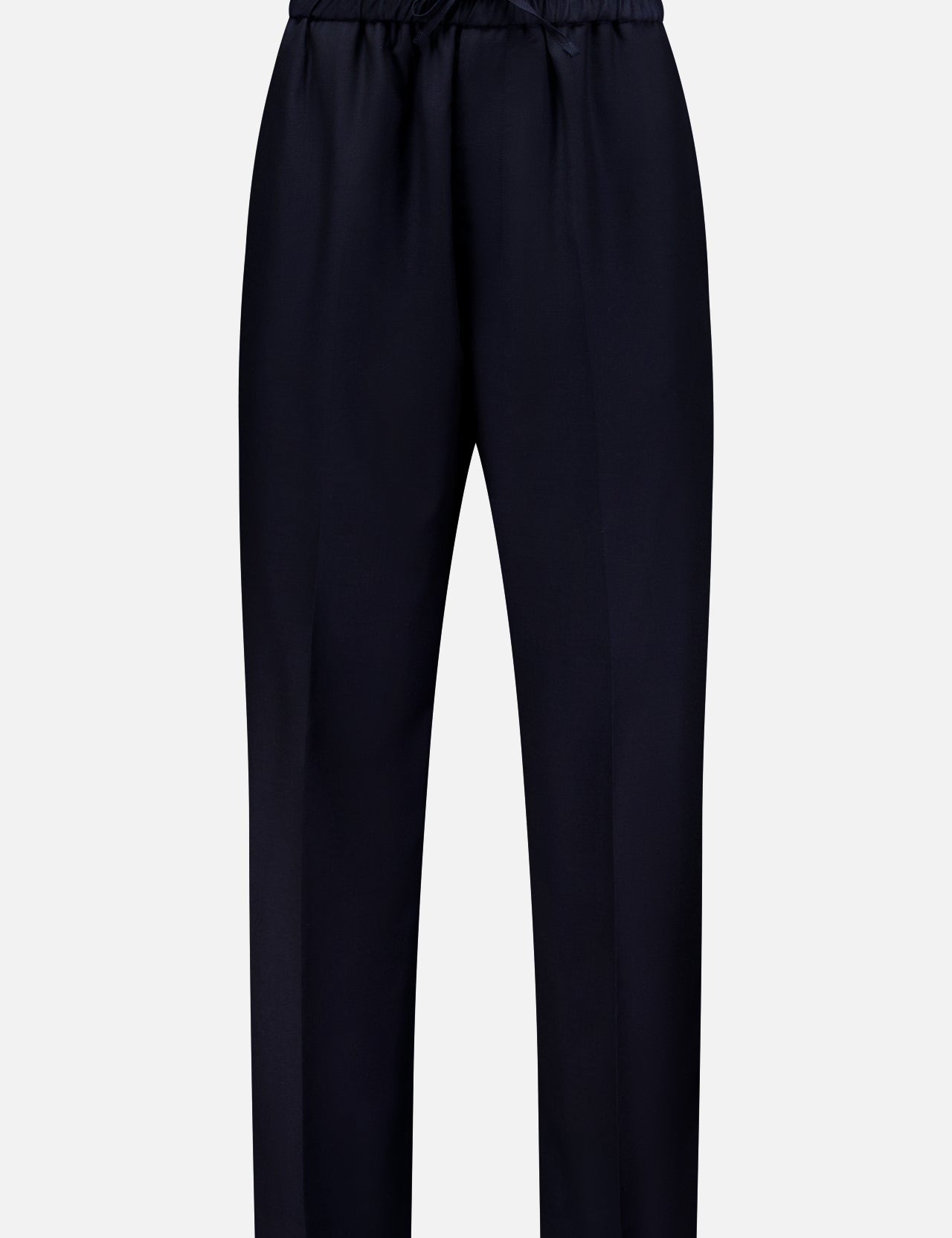 The Nelson Twill Trouser Pants by OFFICINE GÉNÉRALE feature a minimal, tailored design with straight legs, an elastic waistband, and a drawstring closure. Crafted from virgin wool, these black pants are displayed against a plain white background.