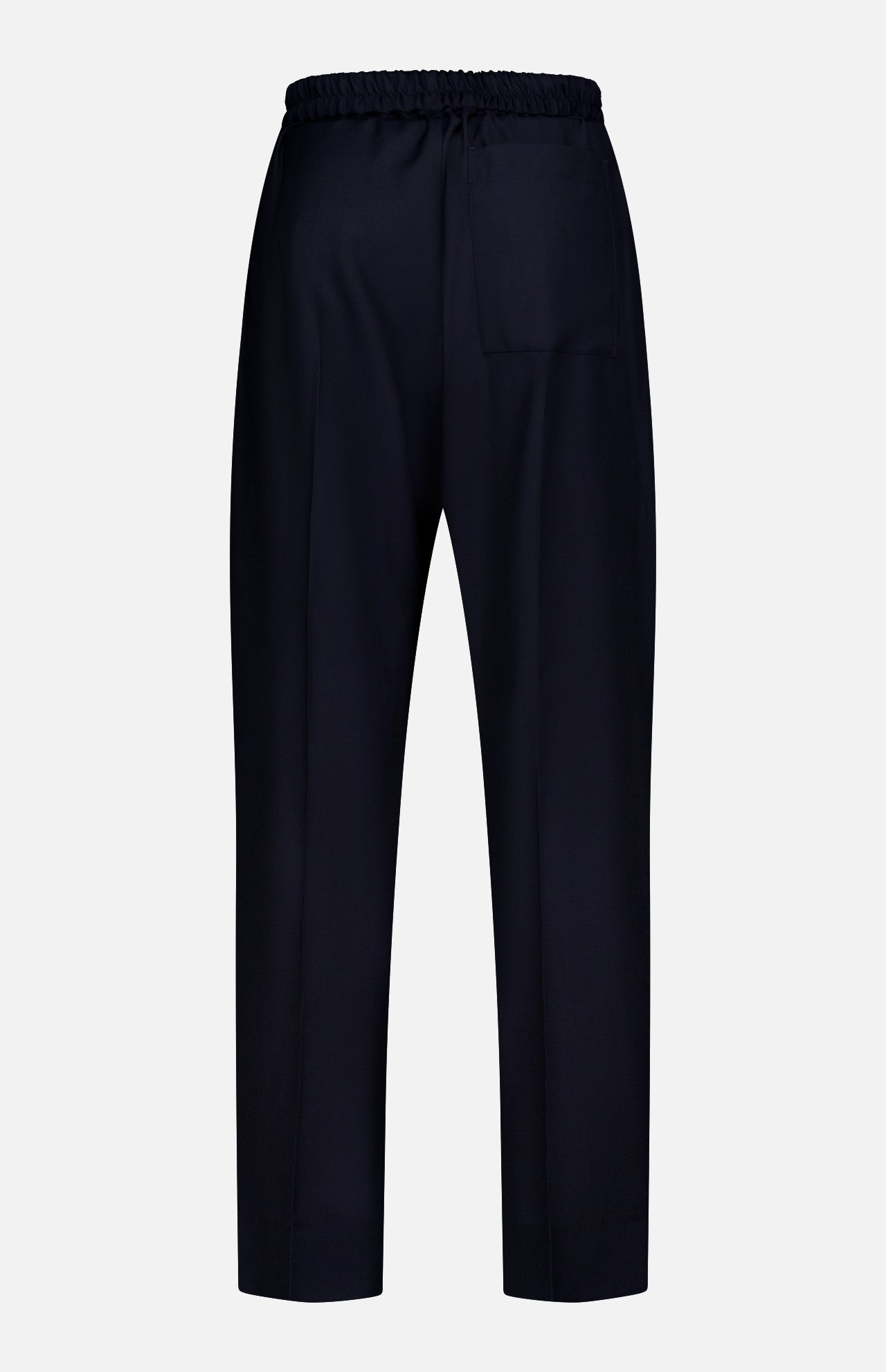The Nelson Twill Trouser Pants by OFFICINE GÉNÉRALE are crafted from soft virgin wool in navy blue, featuring a comfortable elastic waistband, a single rear pocket, and a relaxed wide-leg silhouette. They are displayed against a plain white background.