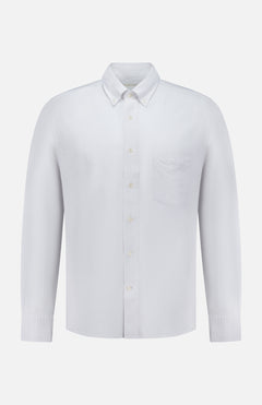 The OFFICINE CREATIVE New Oxford Button Down Shirt is crafted from 100% cotton and features long sleeves, a button-up front with a collar, and a single chest pocket, displayed on a white background.