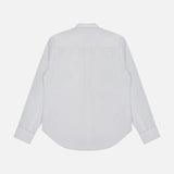 The New Oxford Button Down Shirt by OFFICINE CREATIVE is showcased from the back against a plain white background, highlighting its crisp white 100% cotton fabric, straight yoke, and curved hem. This classic long-sleeve button-up combines timeless style with everyday comfort.