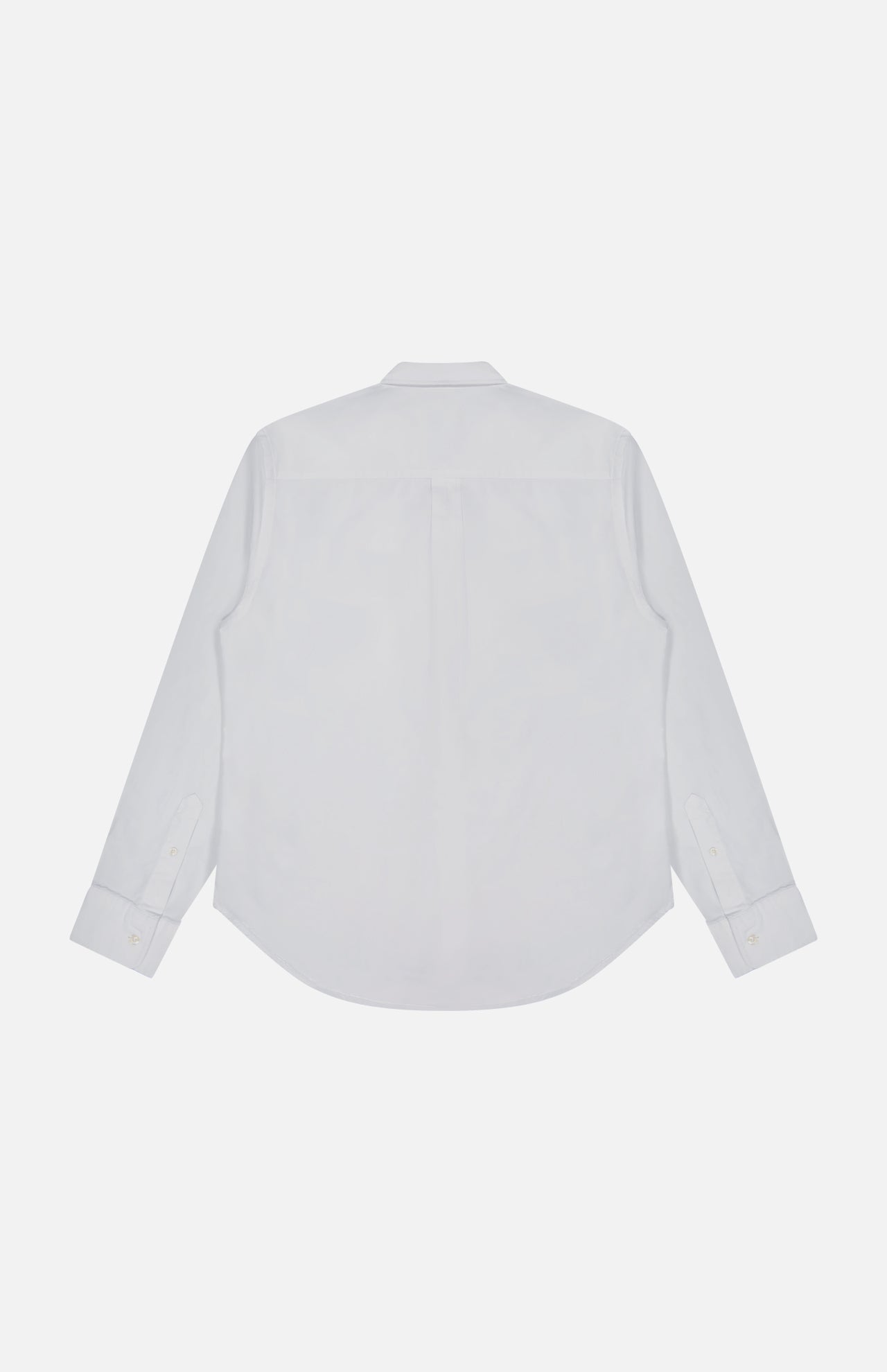 The New Oxford Button Down Shirt by OFFICINE CREATIVE is showcased from the back against a plain white background, highlighting its crisp white 100% cotton fabric, straight yoke, and curved hem. This classic long-sleeve button-up combines timeless style with everyday comfort.