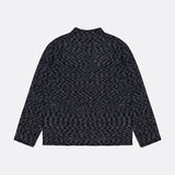 The OFFICINE GÉNÉRALE Riley Mockneck Sweater is a dark gray, long-sleeve knit top featuring a high neckline, displayed flat on a plain white background to showcase the back. Its relaxed fit jumper silhouette blends Parisian-inspired sophistication with cozy comfort.