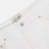 Close-up of the waistband and front pockets of OFFICINE GÉNÉRALE Vintage Original Wash Denim Pants, featuring silver buttons, classic 5-pocket design, and an inner label with the brand name.