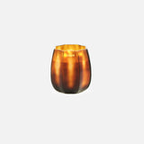Centered on a plain white background, the ONNO Embrace S Sage Candle glows in its round, amber glass holder with a glossy finish—a luxury scented addition to elevate your home fragrance collection.