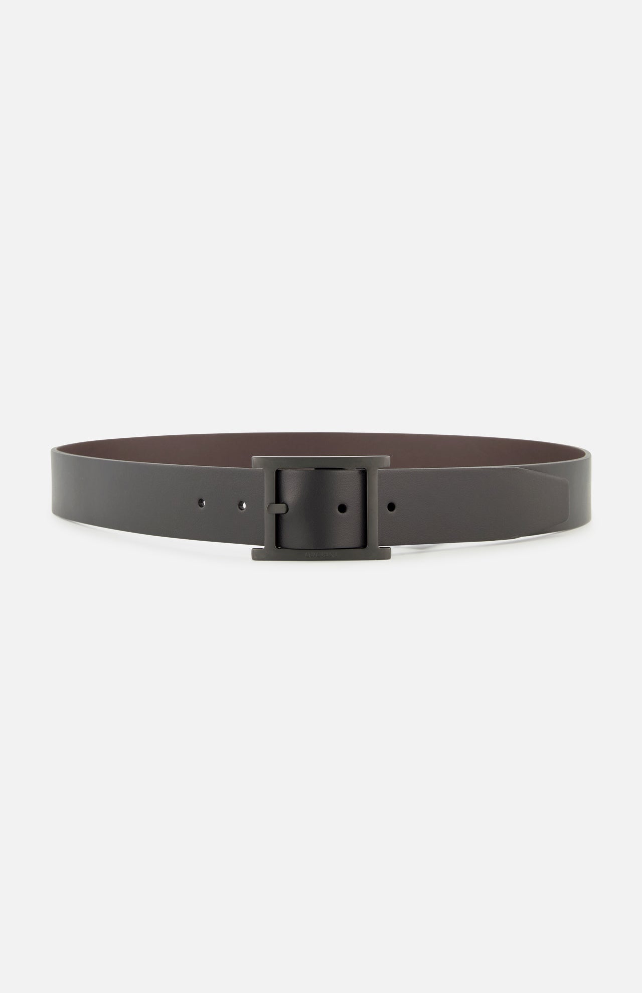 The ORCIANI Monaco Double Reversible Belt, crafted in Italy, features dark brown leather and a rectangular black buckle, displayed laid flat against a white background.