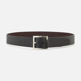The ORCIANI Saffiano Reversible Belt features dark brown leather and a silver rectangular buckle, shown in a circular display against a white background.