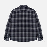 The ORIGINAL MADRAS Check Roundtail Overshirt, crafted from black and white plaid cotton, is laid flat with its back facing up. This men’s easy-care shirt features a classic collar and buttoned cuffs, shown against a plain white background.