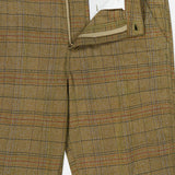 A pair of ORIGINAL MADRAS Check Trouser Pants in tan plaid cotton, showcasing a subtle Madras check pattern and a partially open zipper with button closure that reveals a glimpse of the inner white pocket lining.