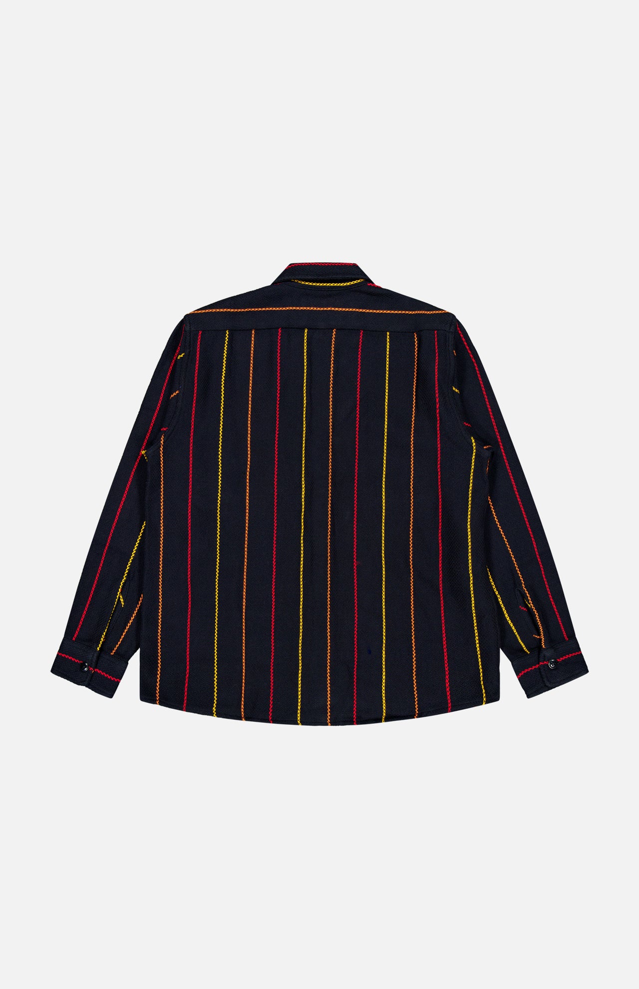 The ORIGINAL MADRAS Pinstripe Roundtail Overshirt is a long-sleeve, button-up style featuring a black base with vertical yellow and red stripes. Crafted from soft Indian cotton, it is shown from the back against a plain white background.