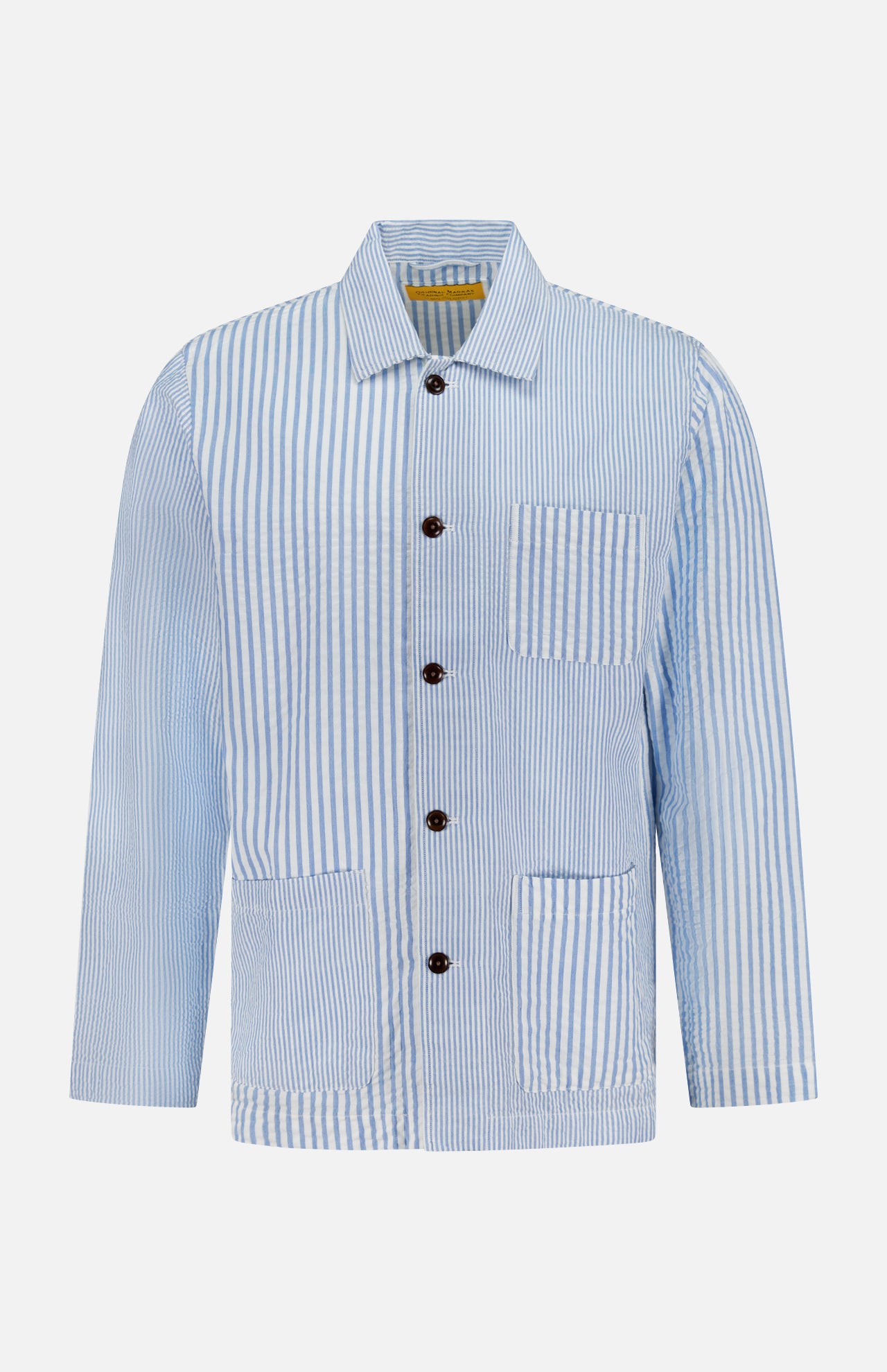 The ORIGINAL MADRAS Seersucker Stripe Shirt Jacket features light blue and white vertical stripes, a collar, black front buttons, and three front pockets—two at the bottom and one on the chest.