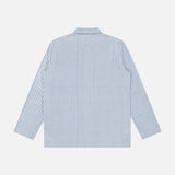 The ORIGINAL MADRAS Seersucker Stripe Shirt Jacket, in blue and white stripes and soft cotton, is shown laid flat with its back up against a plain white background—a versatile piece perfect for layering.