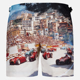 ORLEBAR BROWN’s Bulldog Photographic Race Car Shorts feature a vintage Grand Prix de Monaco print with racing cars, energetic crowds, and city buildings for a bold summer look.