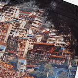 A close-up of ORLEBAR BROWN's Bulldog Photographic Race Car Shorts, showing a vibrant Grand Prix de Monaco print with grandstand crowds, hillside buildings, and pocket stitching—ideal for standout swimwear.