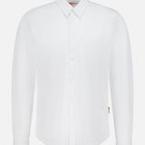 The ORLEBAR BROWN Giles Slim Fit Pique Shirt is a classic white cotton shirt with a collar, buttoned cuffs, and front buttons. Shown on a white background, its timeless slim fit design offers versatile style for any occasion.