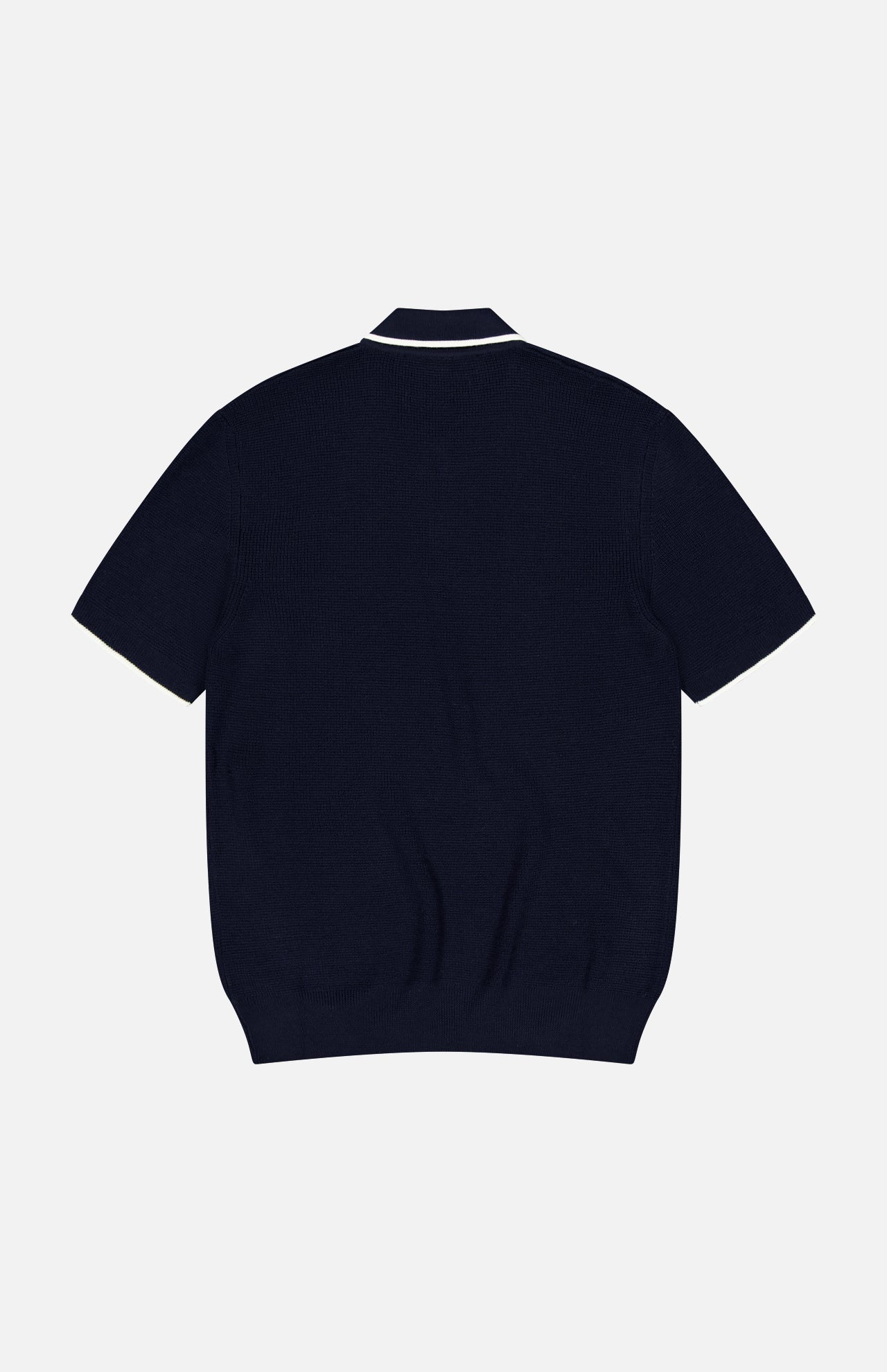 The ORLEBAR BROWN Horton Stripe Johnny Collar Polo in navy wool is displayed from the back on a light grey background, highlighting its ribbed hem and Johnny collar with a thin white trim.