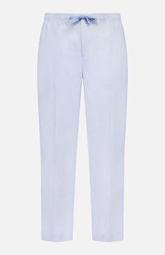 The Alex Relaxed Linen Pants by ORLEBAR BROWN feature light blue linen, a relaxed fit, elastic waistband, and drawstring waist, shown against a plain white background.