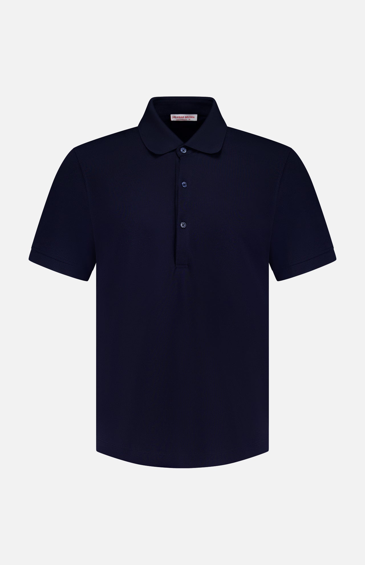 The ORLEBAR BROWN Bruno 3 Button Pique Polo Shirt is a classic fit, short-sleeved navy blue cotton polo with a collar and three-button placket, shown on a white background.