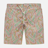 The ORLEBAR BROWN Bulldog Drawcord Carnival Paisley Swim Shorts feature a vibrant paisley print in pink, green, orange, and cream with a white waist drawstring, shown against a plain white background.
