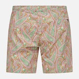 Back view of ORLEBAR BROWN Bulldog Drawcord Carnival Paisley Swim Shorts, featuring a vibrant pink, green, and orange paisley print on a light base with a right-side back pocket.