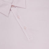 A close-up of a light pink Garfield Long Sleeve Polo Shirt by ORLEBAR BROWN, made from cotton pique jersey with a collar, three buttons, and a red and white brand label inside the collar.