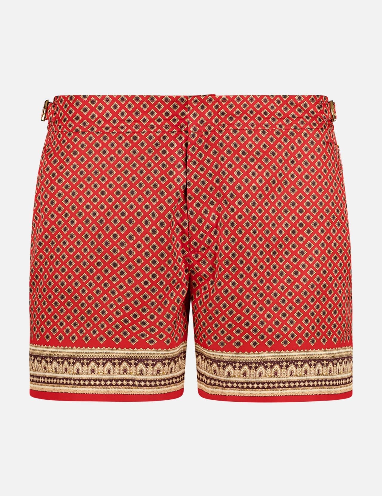 The ORLEBAR BROWN Setter Solmio Shorts feature a red and gold floral geometric pattern, decorative horizontal hem borders, a tailored fit, adjustable side tabs, and quick-drying fabric for comfort.