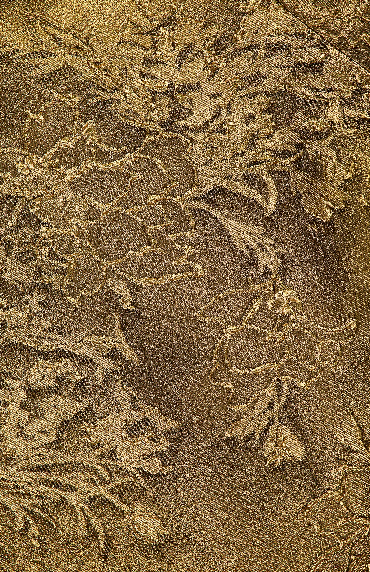 Close-up of the PAMELLA ROLAND Jacquard Cocktail Dress, showcasing intricate floral brocade with raised, shimmering textures that radiate gilded glamour.