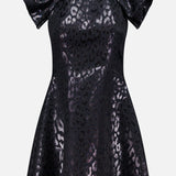 The PAMELLA ROLAND Lurex Jacquard Mini Dress features a black animal print with a shiny leopard pattern, dramatic oversized ruffled shoulders, and metallic sheen, shown against a plain white background.