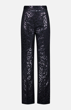 The Lurex Jacquard Leopard Print Pant by PAMELLA ROLAND features a high-waisted, straight-leg cut with a shiny metallic leopard pattern—shown from the back on a white background. Perfect bold statement pants for any wardrobe.