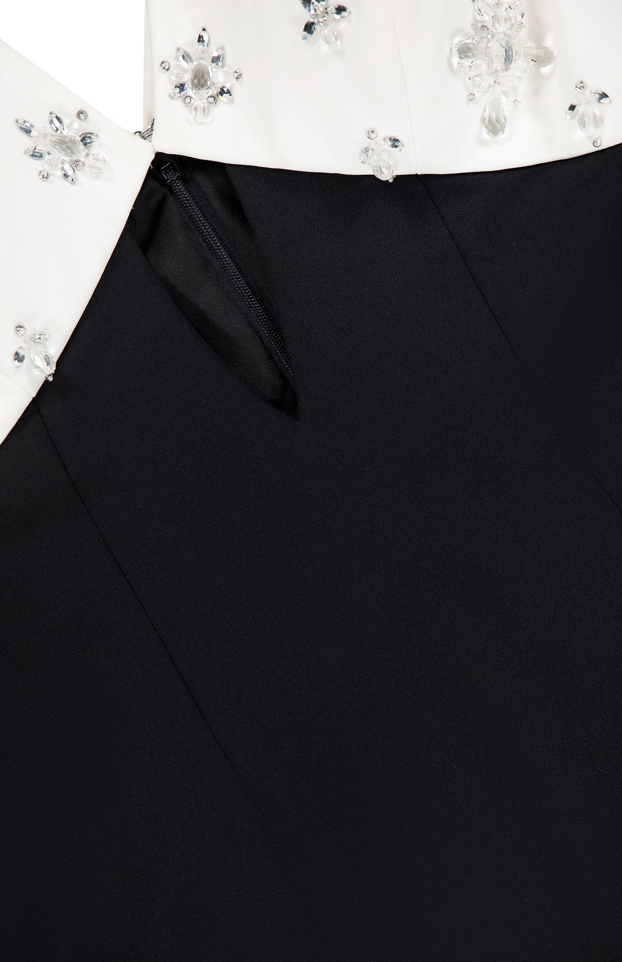 Close-up of the PAMELLA ROLAND Crystal Embroidered Crepe Gown, featuring a white jeweled floral collar and visible black zipper—an elegant choice for special occasions.