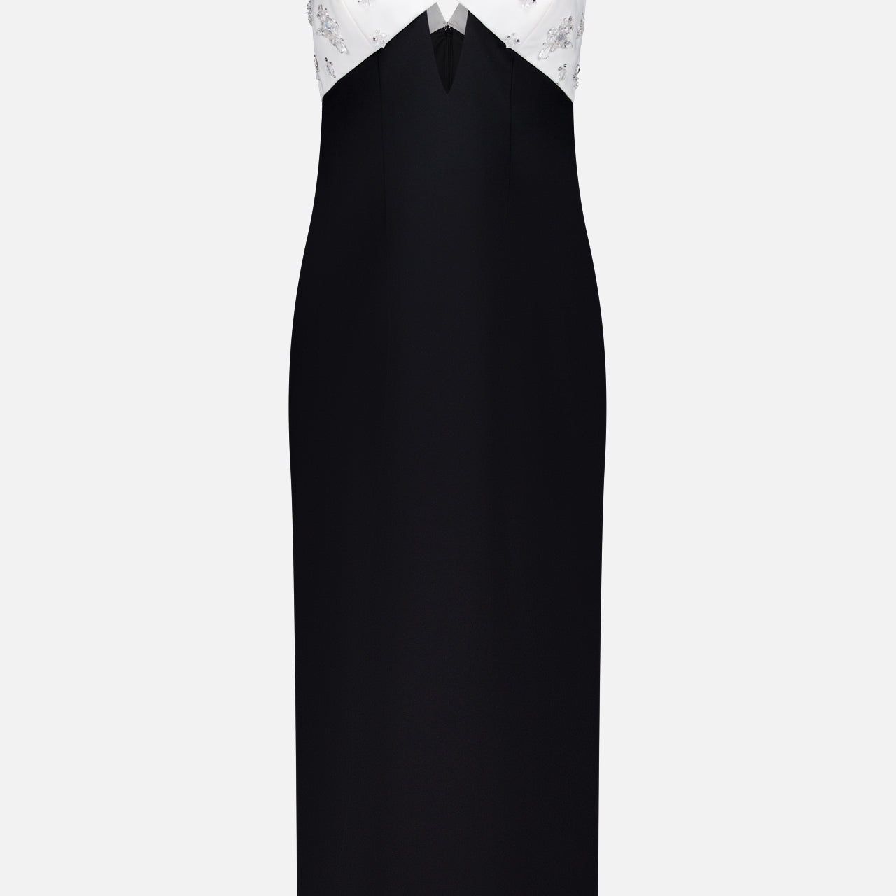 The Crystal Embroidered Crepe Gown by PAMELLA ROLAND features a sleeveless design with a fitted black skirt, white V-neck bodice adorned with subtle florals, and a stylish triangular cutout—ideal for chic special occasions.
