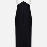 The Crystal Embroidered Crepe Gown by PAMELLA ROLAND features a white V-neck, sleeveless bodice with floral embellishments and a black ankle-length skirt. Its fitted silhouette and front seam make it perfect for special occasions.