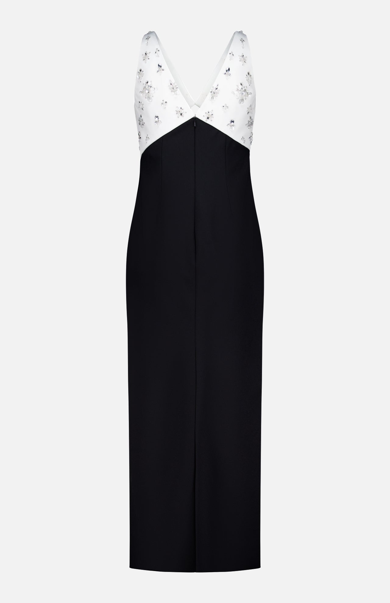 The Crystal Embroidered Crepe Gown by PAMELLA ROLAND features a white V-neck, sleeveless bodice with floral embellishments and a black ankle-length skirt. Its fitted silhouette and front seam make it perfect for special occasions.