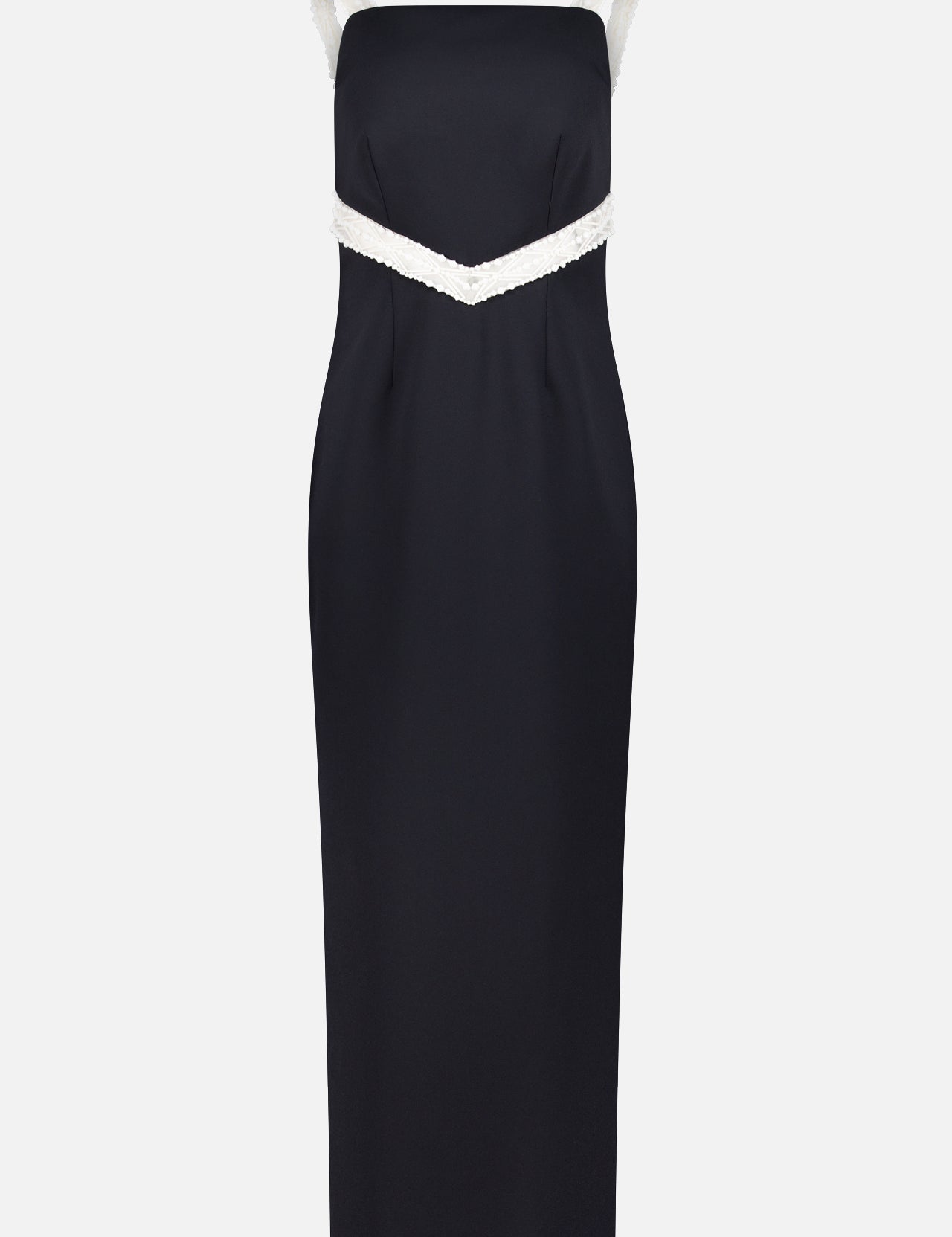 The PAMELLA ROLAND Embroidered Tulle W Crepe Gown is a fitted, sleeveless black dress with white-trimmed shoulder straps, a V-shaped accent under the bust, and an elegant straight ankle-length silhouette—perfect for special occasions.
