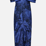 The Fil Coupe Off The Shoulder Gown by PAMELLA ROLAND features an off-the-shoulder, navy silhouette with intricate fil coupe floral patterns and a structured fold-over neckline. Displayed against a plain white background, the textured detailing and contemporary midi length highlight the refined elegance inspired by traditional gown artistry.