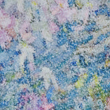Close-up of a textured abstract painting with dabs of blue, pink, purple, yellow, and white, creating a soft, impressionistic pattern reminiscent of the delicate shimmer featured on the PAMELLA ROLAND Printed Sequin Gown.