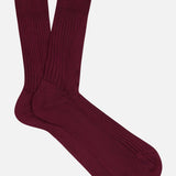 Pair of ribbed, dark burgundy Pantherella Baffin Silk Tailored Socks.
