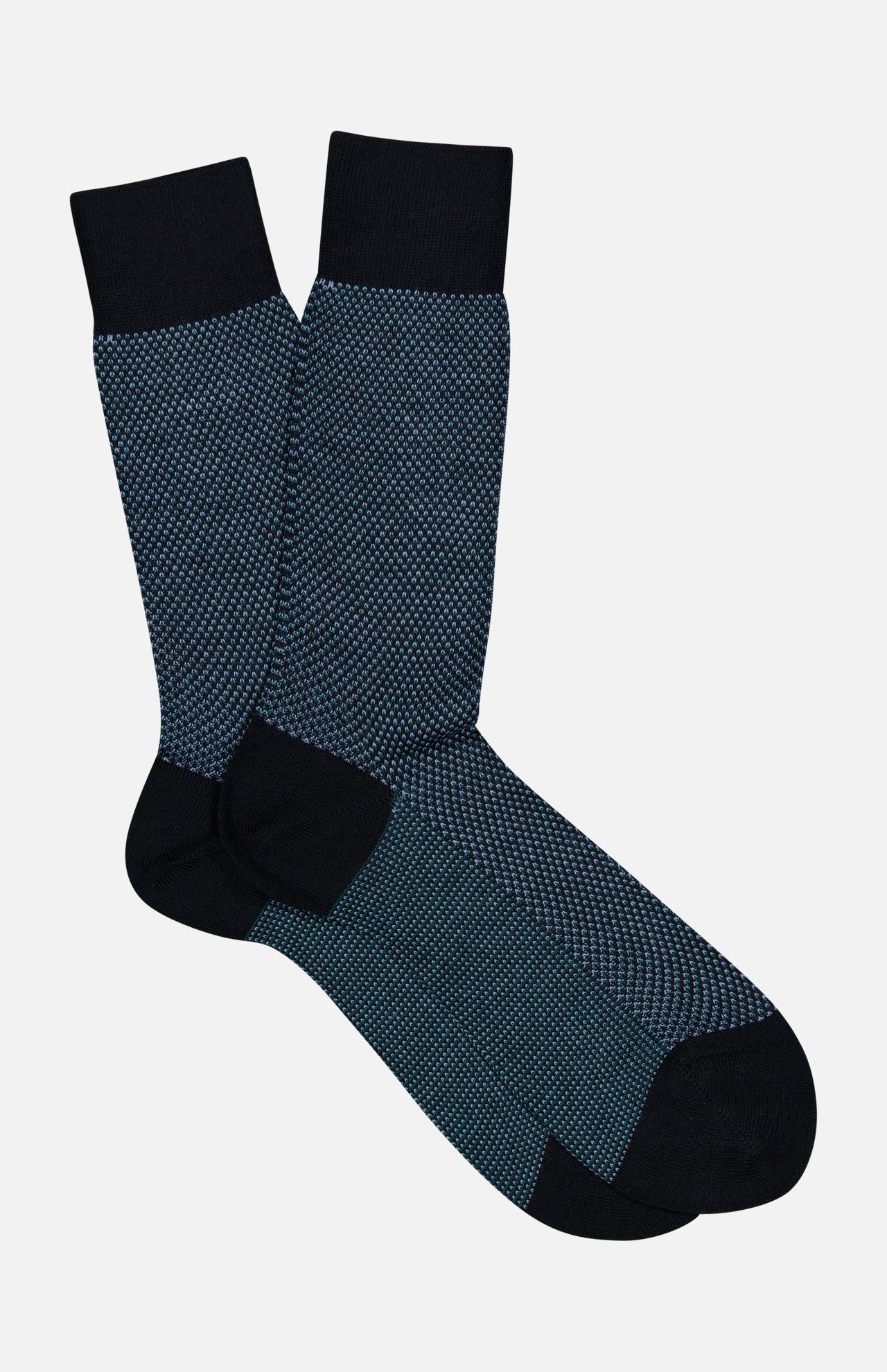 A pair of Blenheim Birdseye Merino Wool Socks featuring a dark blue and black textured pattern with solid black cuffs, heels, and toes.