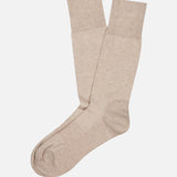 A pair of Finchley Ribbed Socks by PANTHERELLA in light beige, crew-length, laid flat on a white background.