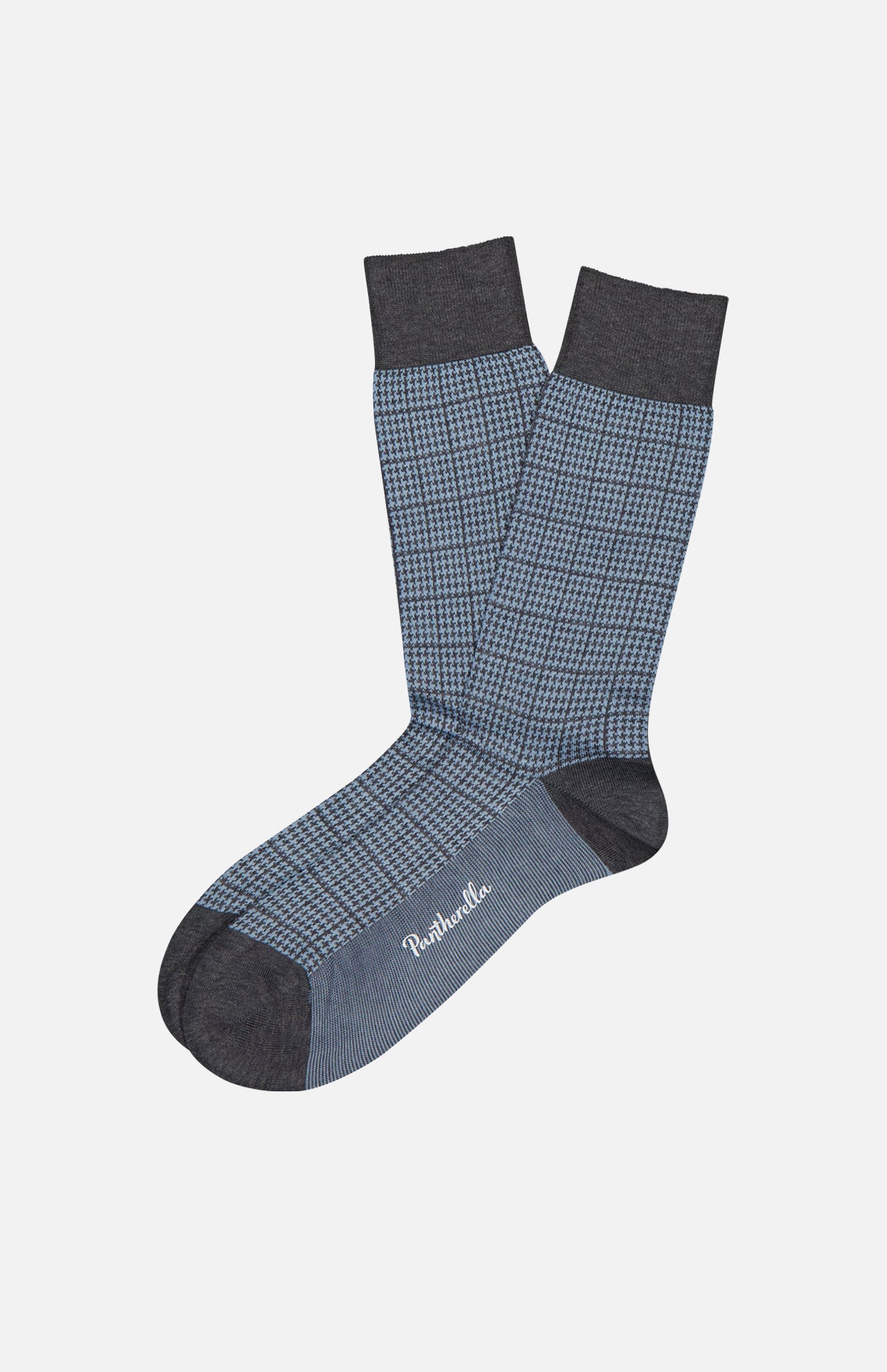 The Lewyn Houndstooth Sock by PANTHERELLA features a blue and black houndstooth pattern with solid dark cuffs, heels, and toes. "Pantherella" is printed in white near the toes—classic English socks made in England.