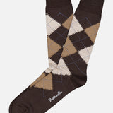Pantherella Racton Argyle Merino Wool socks in a brown, tan, and cream argyle pattern.