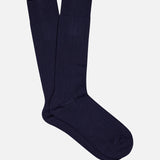 The Seaford Sock by PANTHERELLA is a pair of plain, dark navy blue crew socks made in England, shown laid flat on a light background.