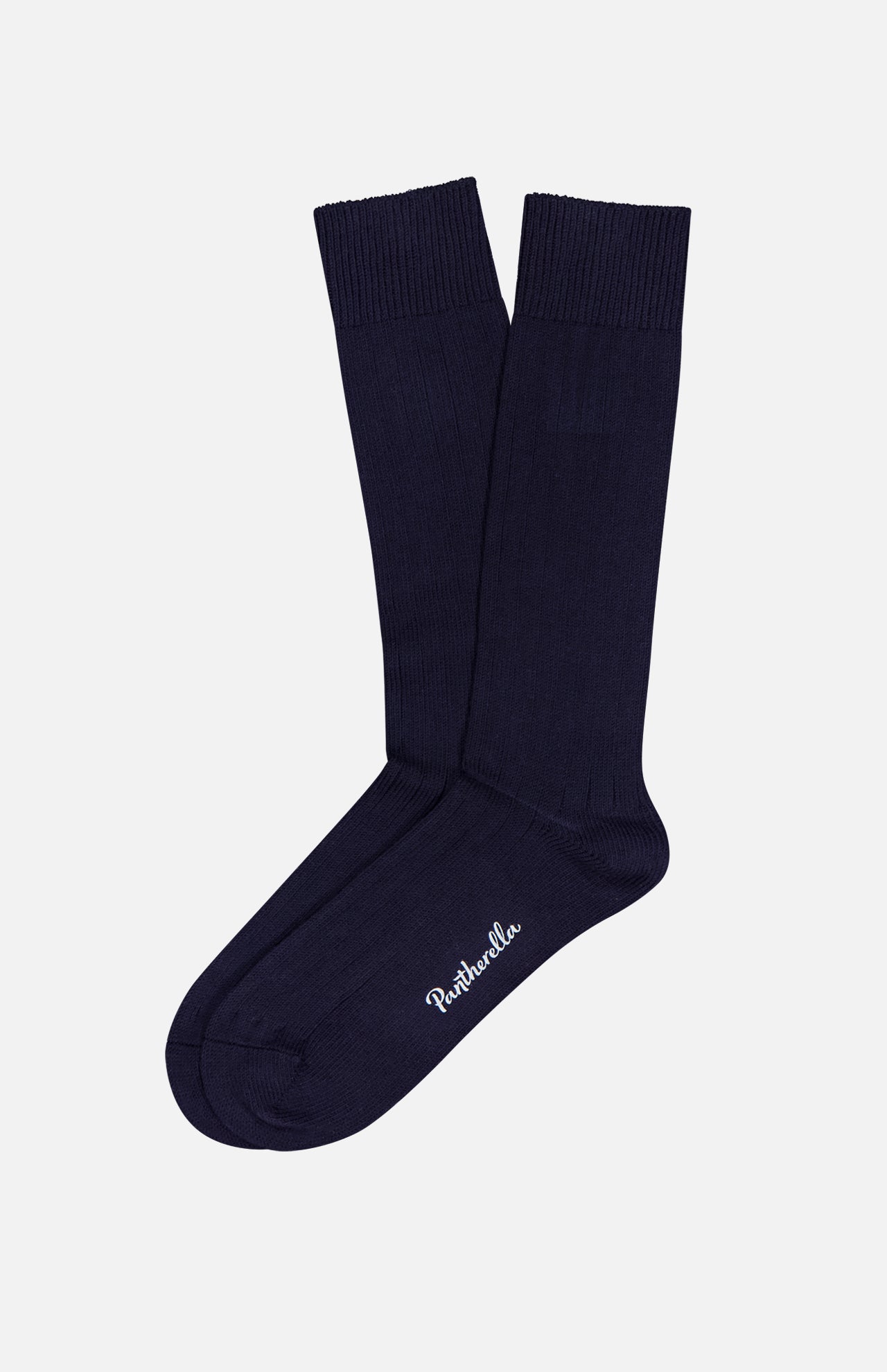 A pair of Seaford Socks by PANTHERELLA in navy blue ribbed organic cotton, featuring white brand embroidery near the toe—authentic English socks showcased on a plain white background.