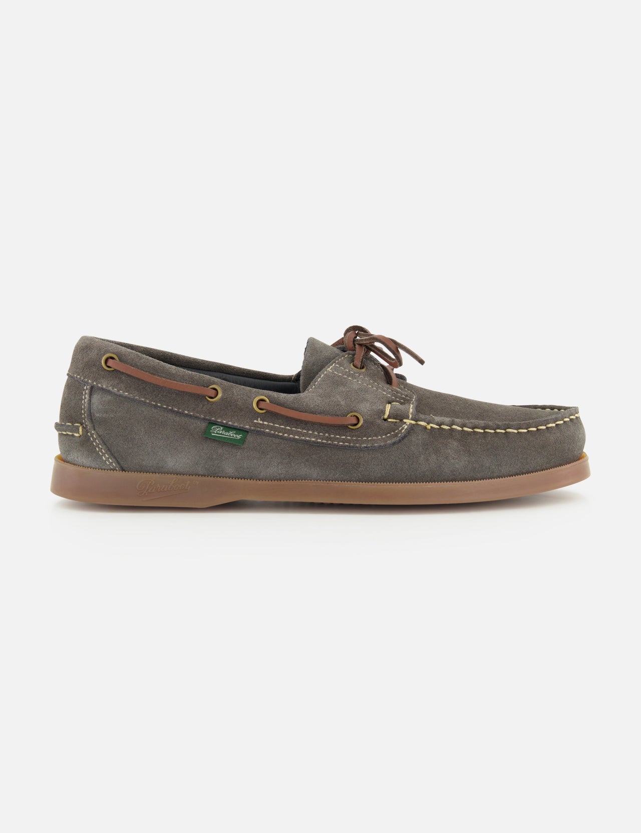 The Paraboot Barth Bateaux Boat Loafer is a gray-brown hand-stitched shoe with brown laces, tan stitching, and a light brown rubber sole, shown in side profile against a white background—highlighting timeless style and craftsmanship.
