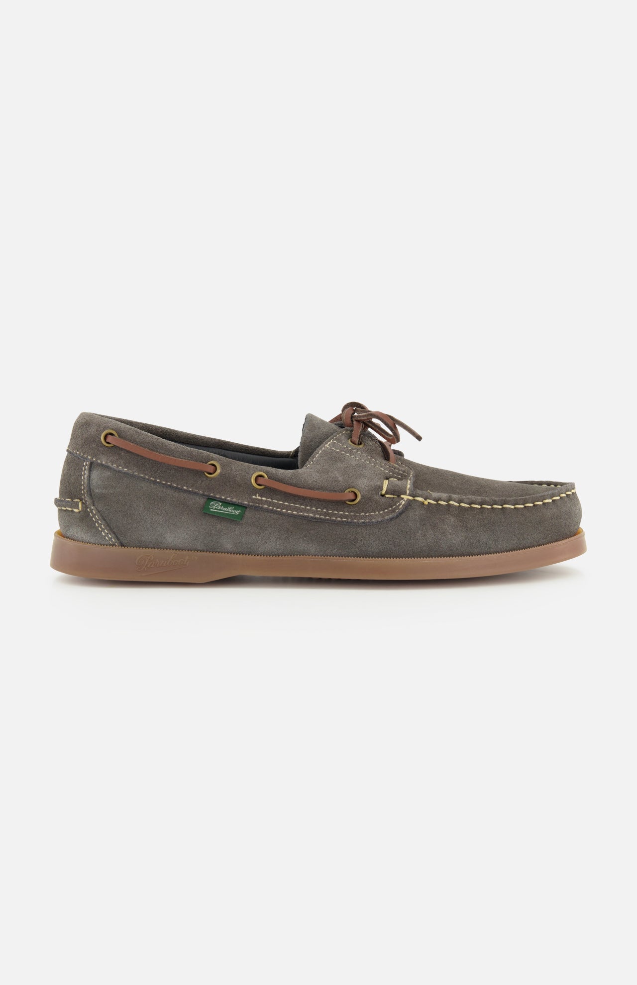 The Paraboot Barth Bateaux Boat Loafer is a gray-brown hand-stitched shoe with brown laces, tan stitching, and a light brown rubber sole, shown in side profile against a white background—highlighting timeless style and craftsmanship.