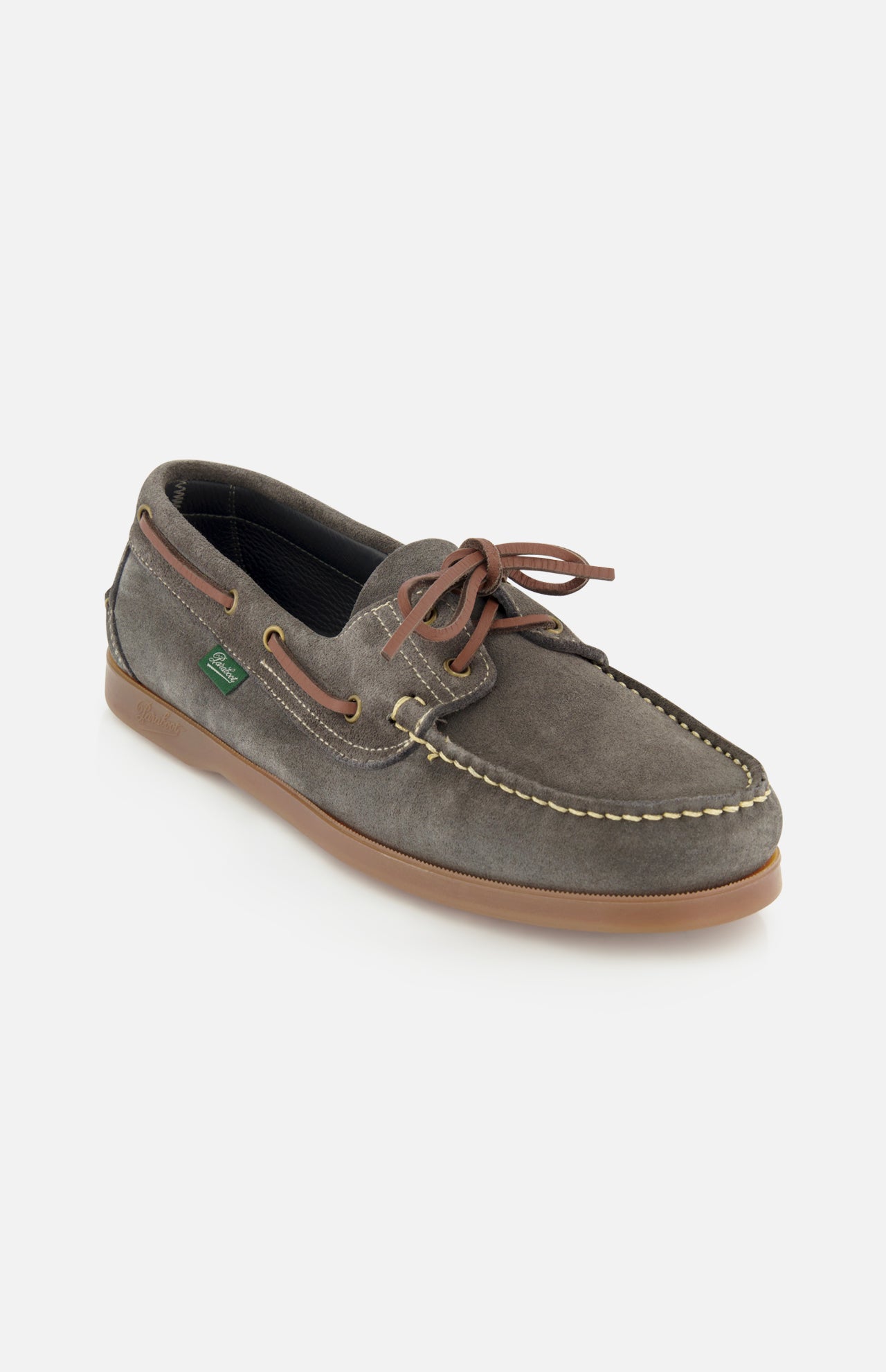 The Paraboot Barth Bateaux Boat Loafer is a single gray suede shoe with brown leather laces, stitching, low profile, rubber sole, side eyelets, and Norwegian welt construction, shown on a white background.